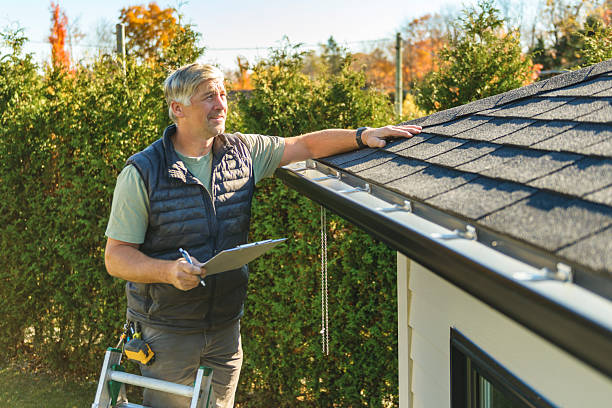 Professional Hail Damage Roof Repair technician working in Forest Hill, MD